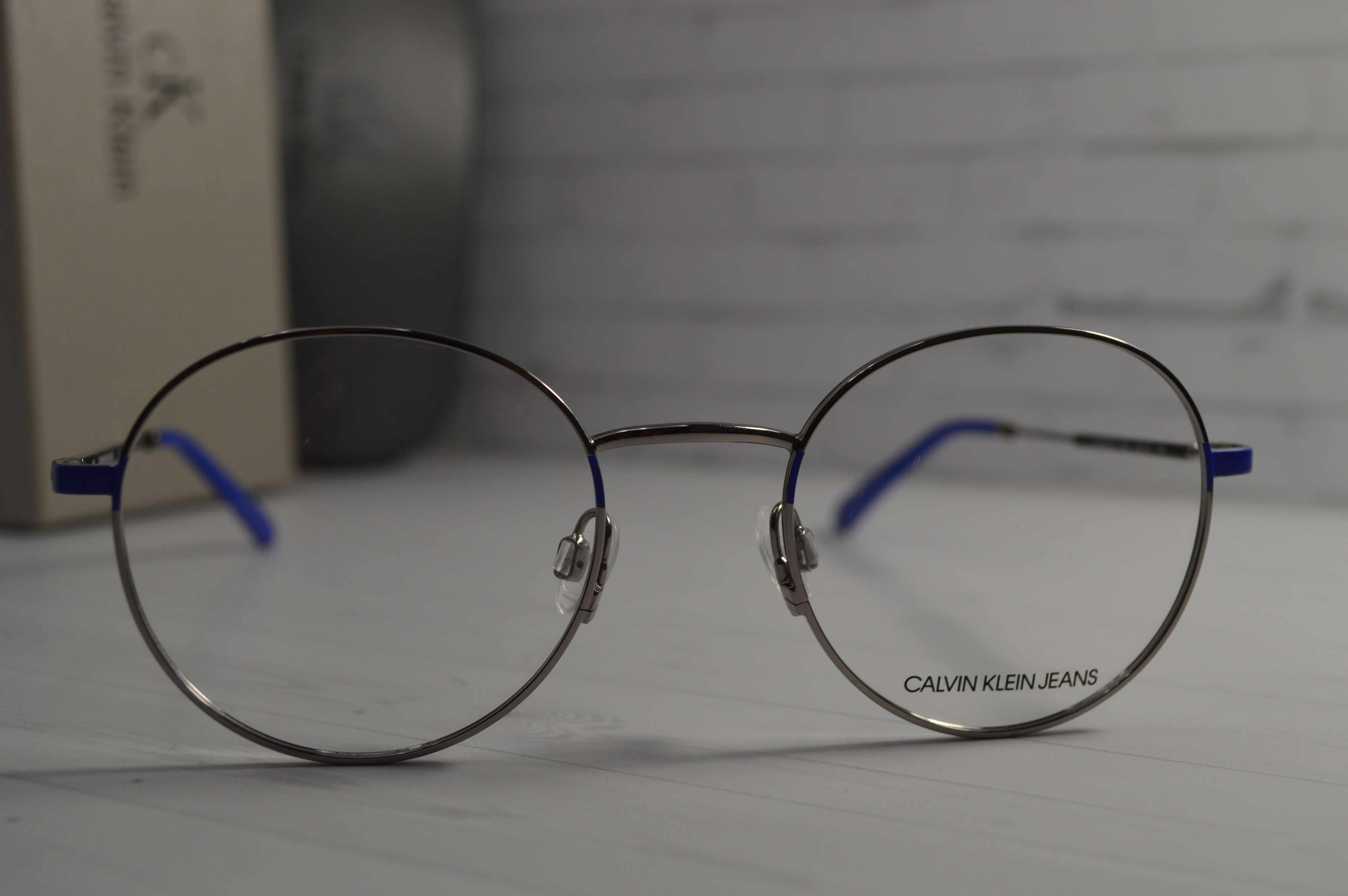 Оправа круглая серебристая с синими душками Calvin Klein Jeans 20218