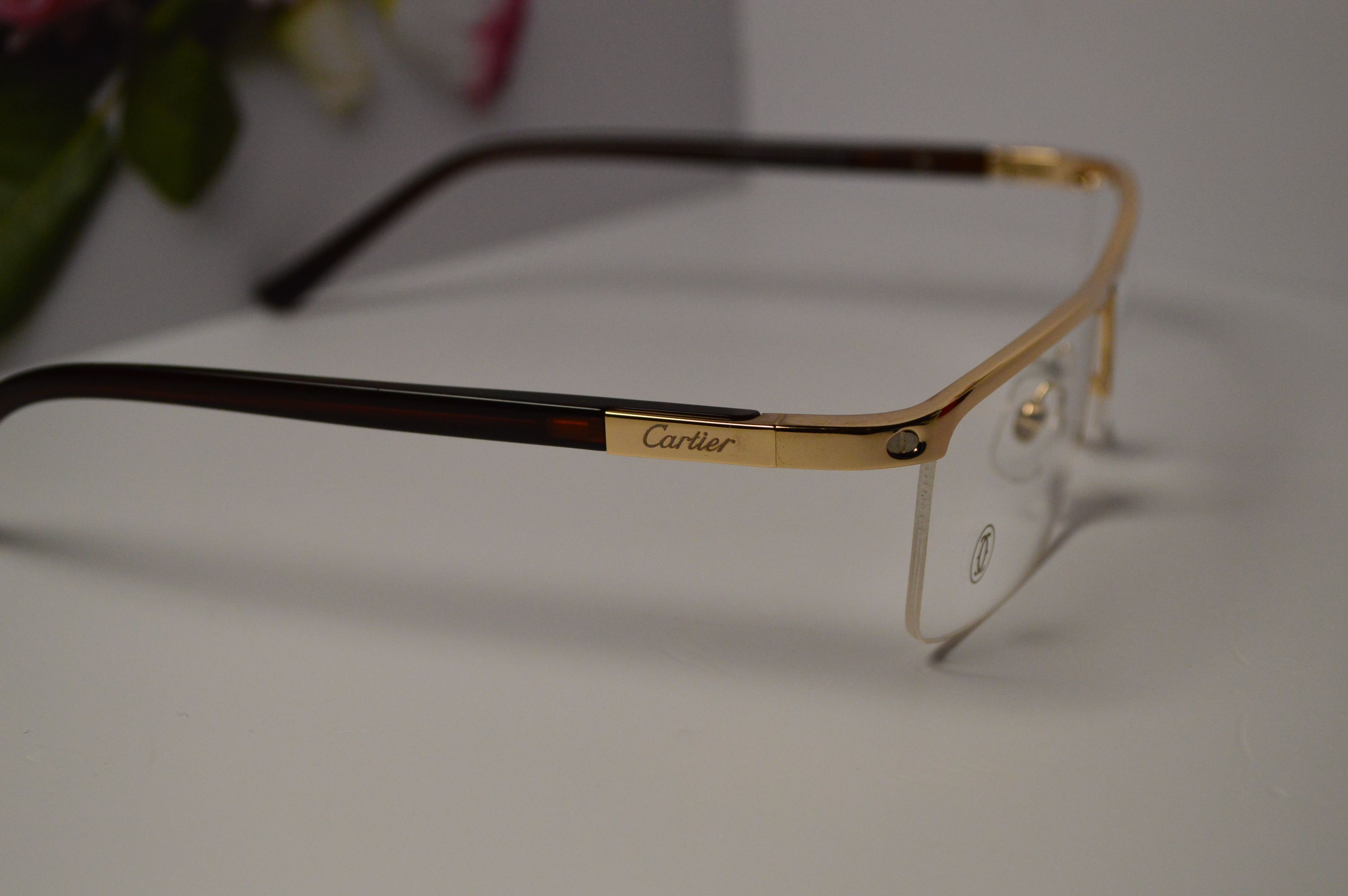 Оправа мужская, стиль от Cartier, модель 8100815 С4. Золотистая полуободковая оправа, коричневые дужки