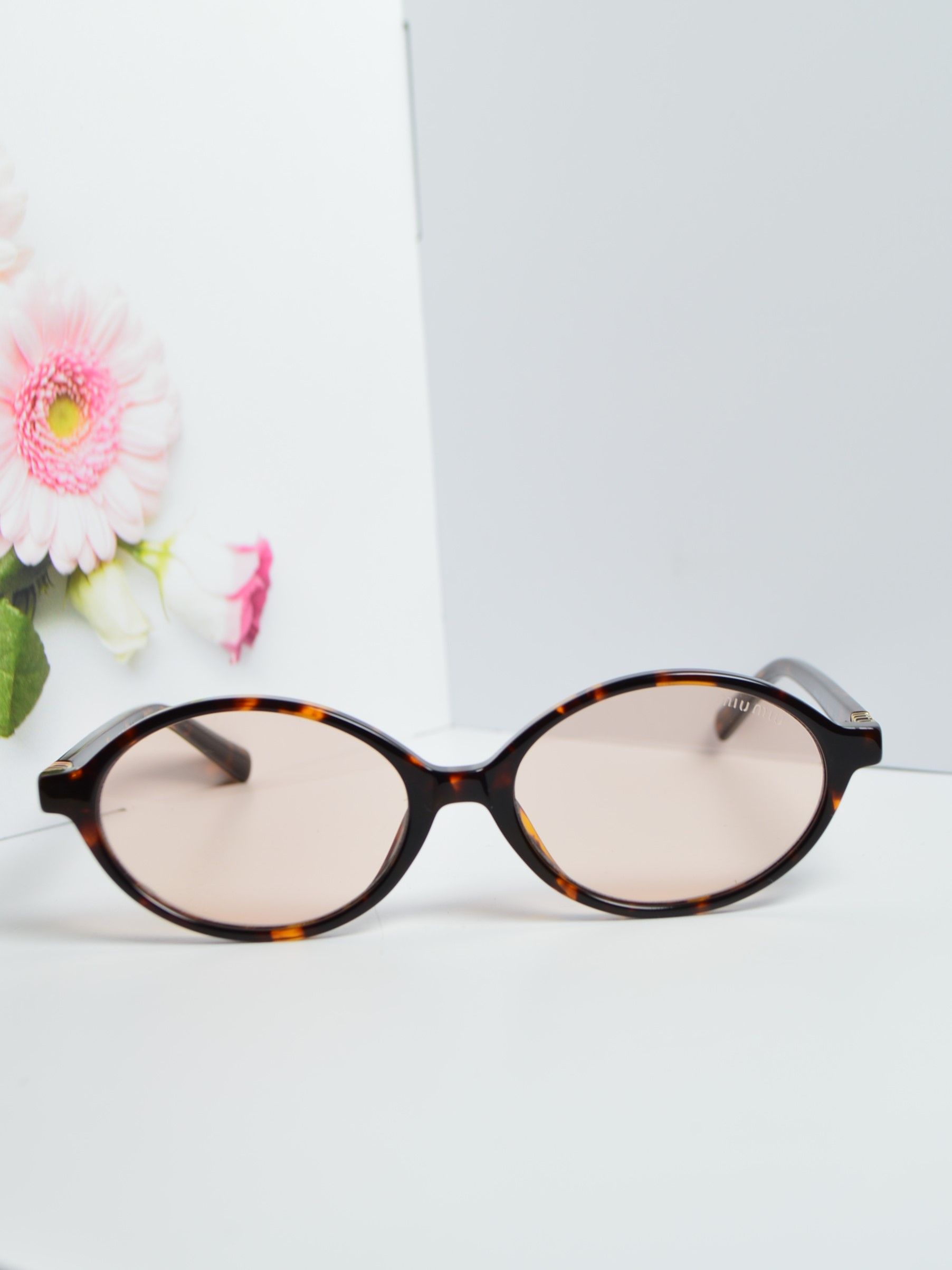 Солнцезащитные очки овальные, стиль от MiuMiu SMU 04Z